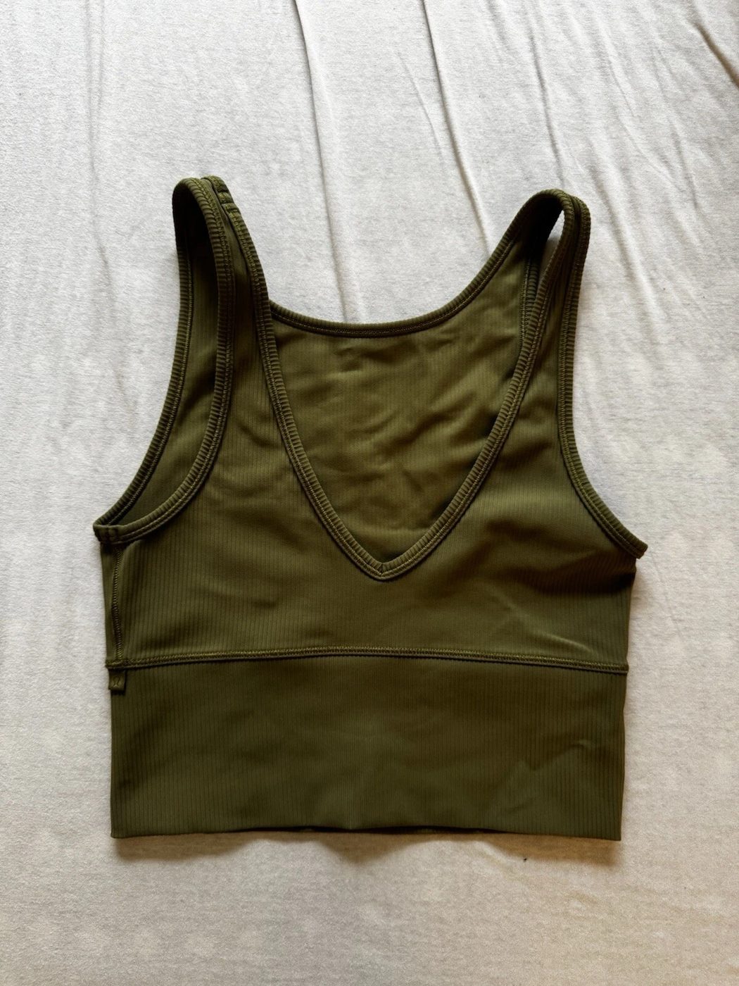 Pre-owned lululemon Power Pivot Tank in Luxtreme fabric, graded for wholesale resale
