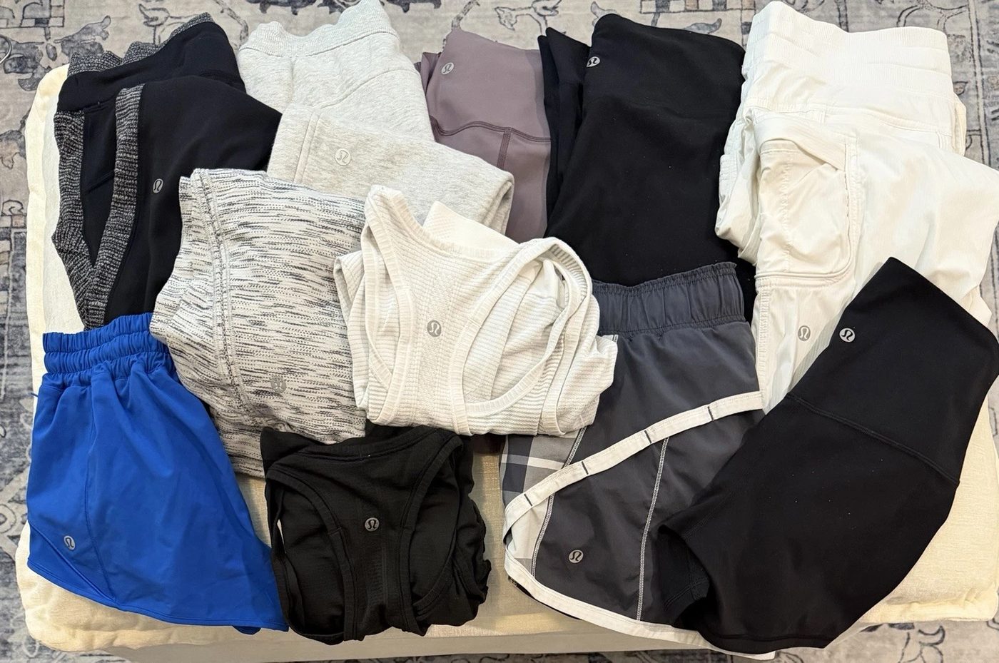 Flat-lay of pre-owned lululemon shorts from a ThriftUp wholesale lot